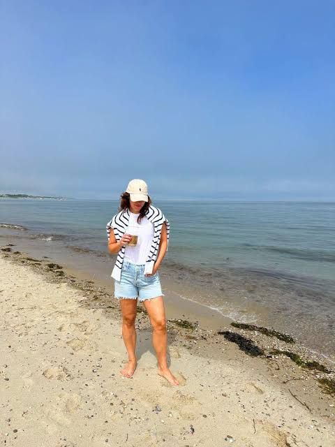 Distressed Denim Shorts with Striped Sweater on the Beach — Nantucket Outfits