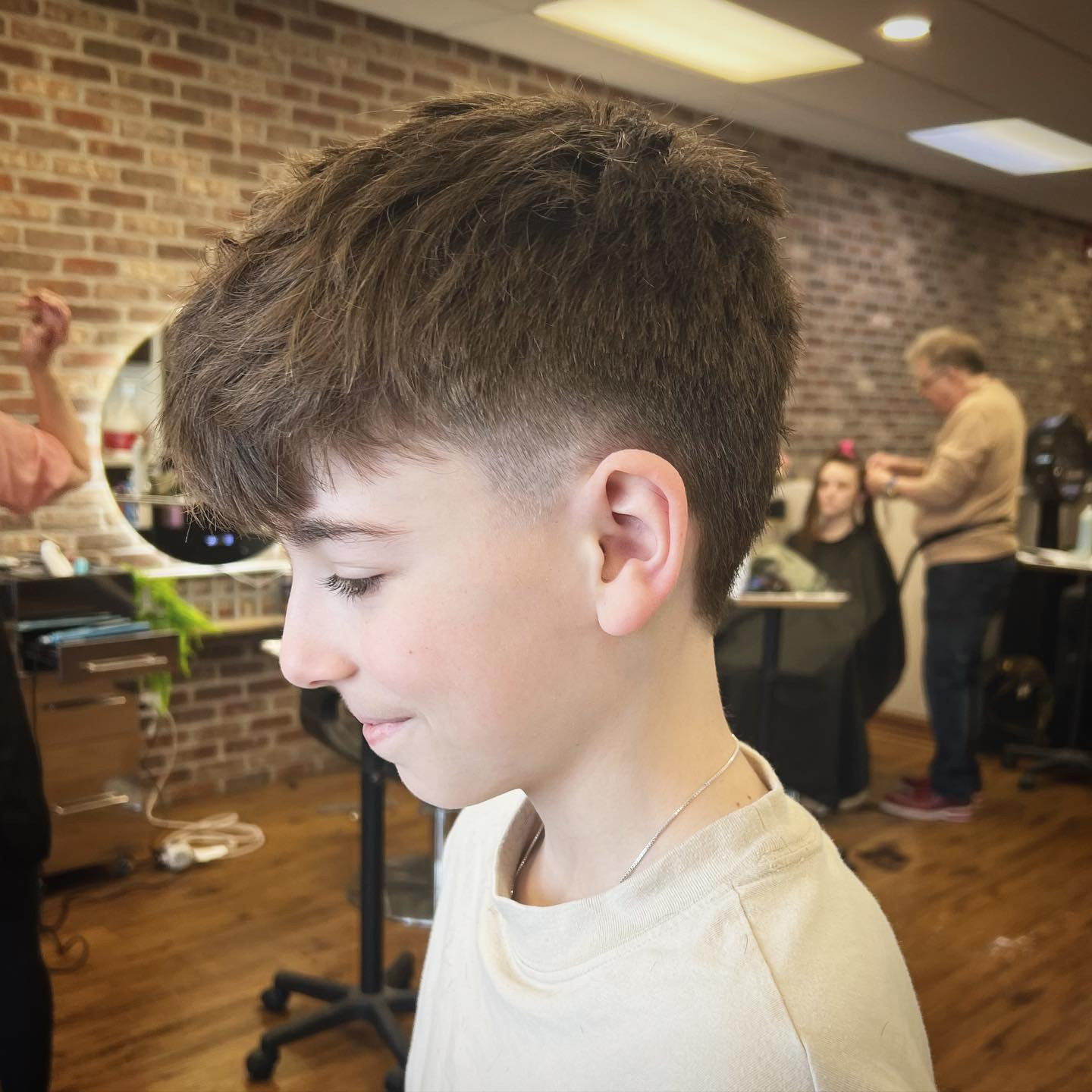 Taper Fade With Long Textured Fringe Taper Fade With Long Textured Fringe — Boys Haircuts