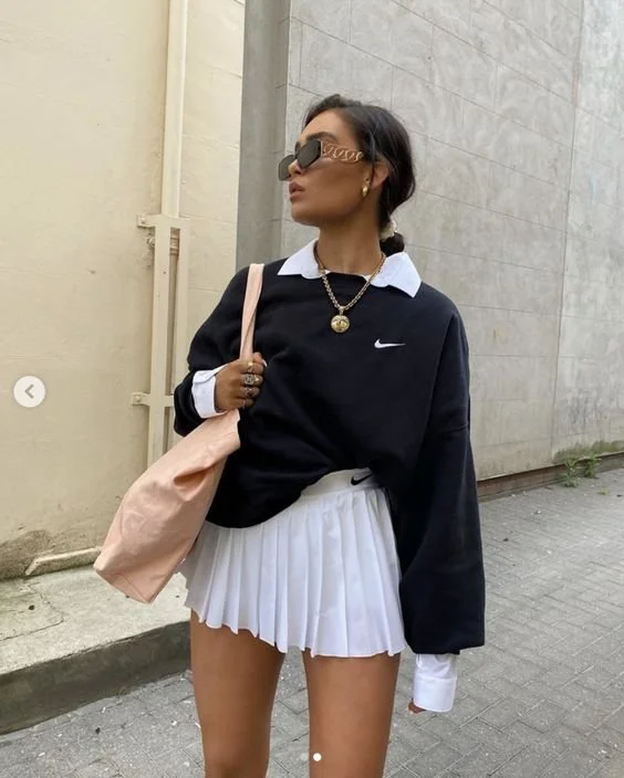 White Pleated Mini Skirt Layered with Collared Shirt and Crewneck Sweatshirt White Pleated Mini Skirt Layered with Collared Shirt and Crewneck Sweatshirt — Tennis Skirt Outfits