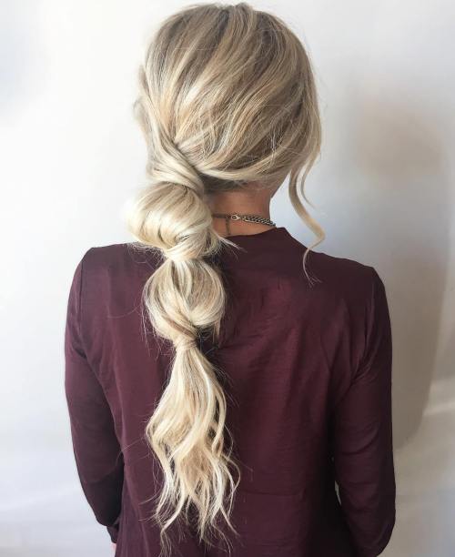 Relaxed Ash Blonde Bubble Ponytail with Loose Waves Relaxed Ash Blonde Bubble Ponytail with Loose Waves