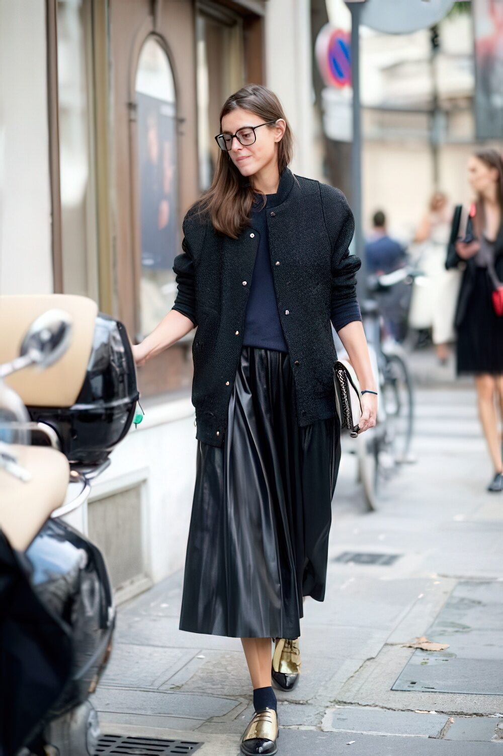 Street Style: Bomber Jacket, Sweater, and Faux Leather Pleated Skirt — Pleated Skirt Outfits
