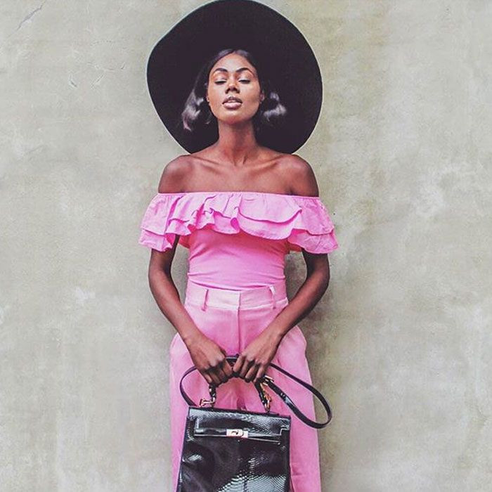 Pink Off-the-Shoulder Top with Wide-Leg Pants and Black Hat — Kentucky Derby Outfits