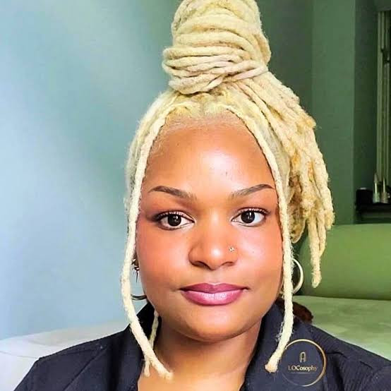Striking Platinum Blonde Coily Locs Updo Striking Platinum Blonde Coily Locs Updo — Blonde Locs