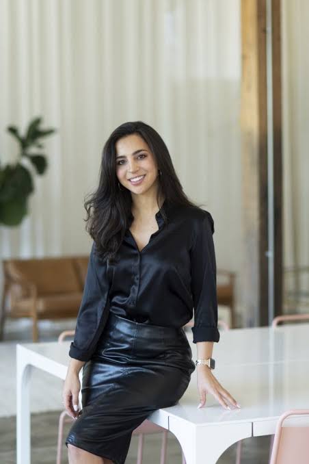 Modern Professionalism: Black Satin Blouse and Leather Skirt — Headshot Outfits
