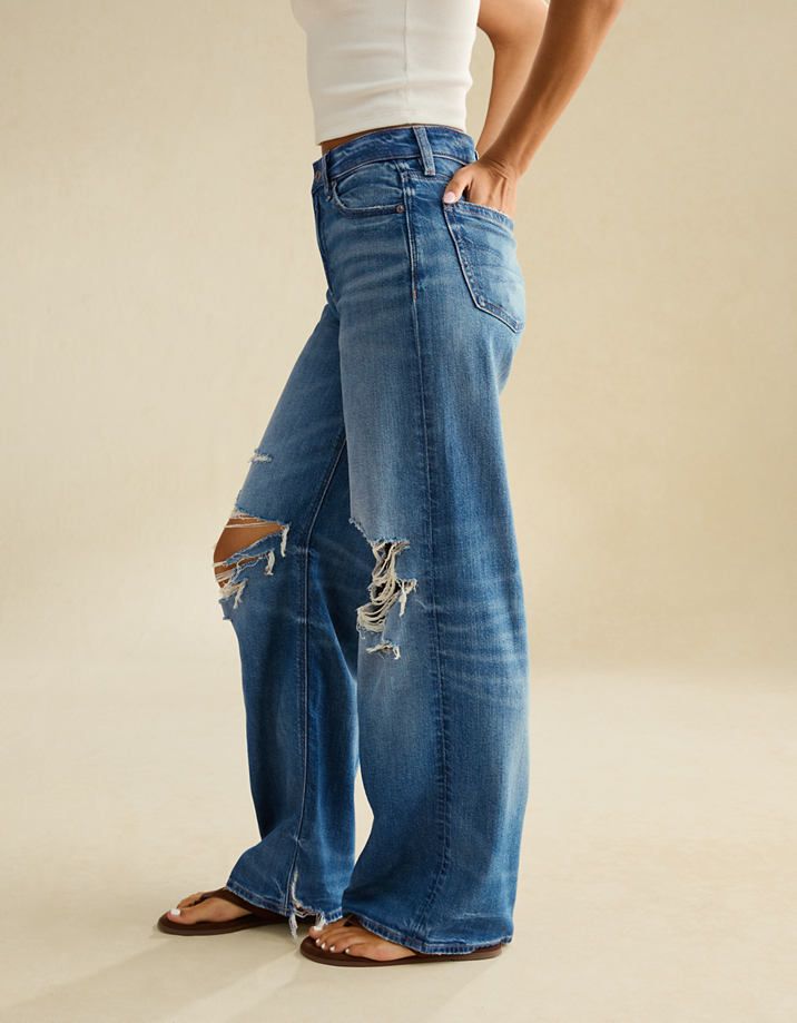 Baggy Ripped Jeans with Ribbed Tank and Flip-Flops