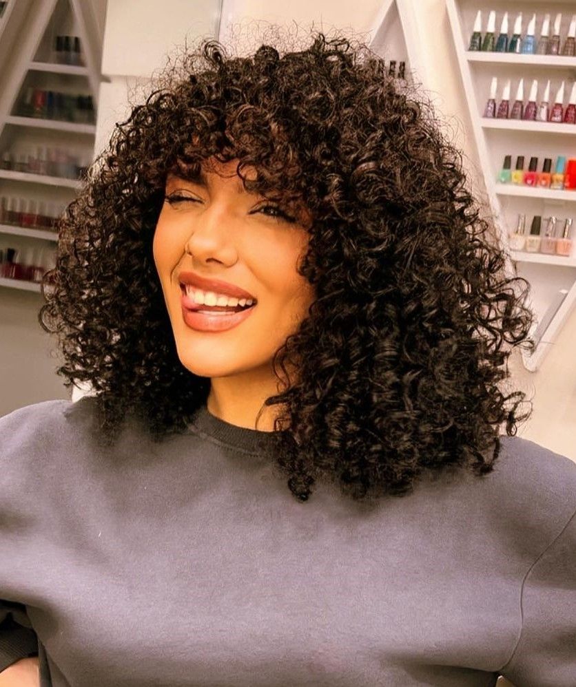 Layered Bob With Defined Curls Layered Bob With Defined Curls — Loose Perm