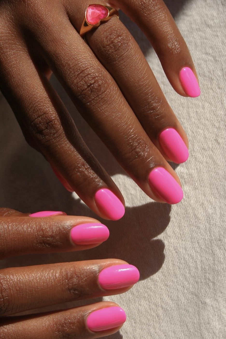 The Single Detail A Reader Notices First Bright Hot Pink Glossy Short Oval — Hot Pink Nails