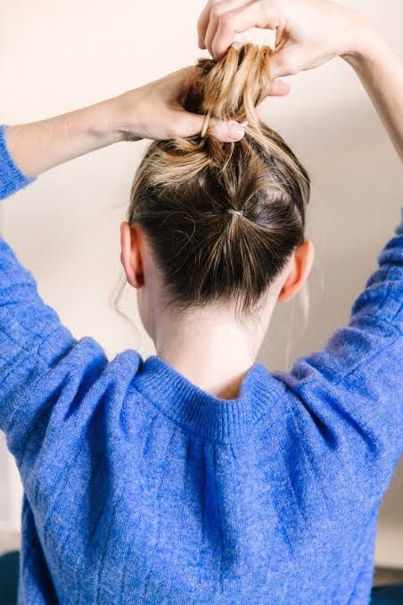 Messy Top Knot On Short Blonde Bob Messy Top Knot On Short Blonde Bob
