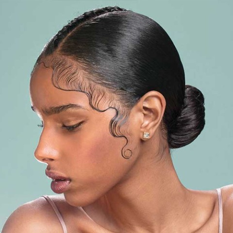 Artistic Baby Hair Swirls on a Sleek Bun — Baby Hairs