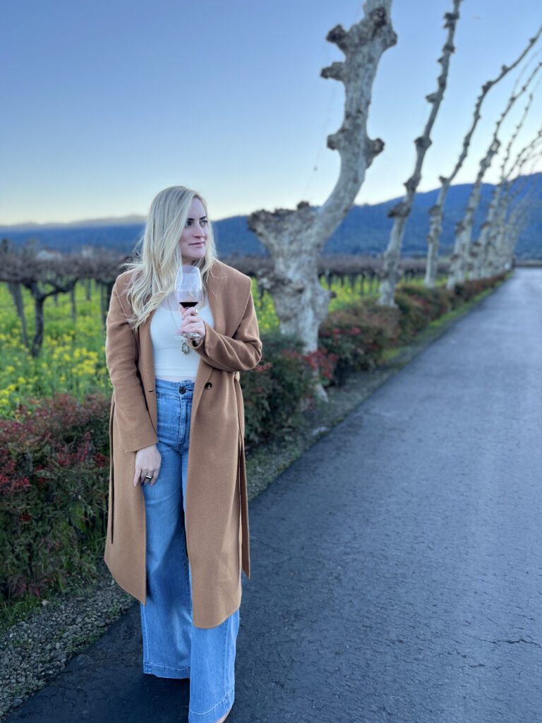 Long Camel Coat Over Denim for Cooler Winery Days — Winery Outfits