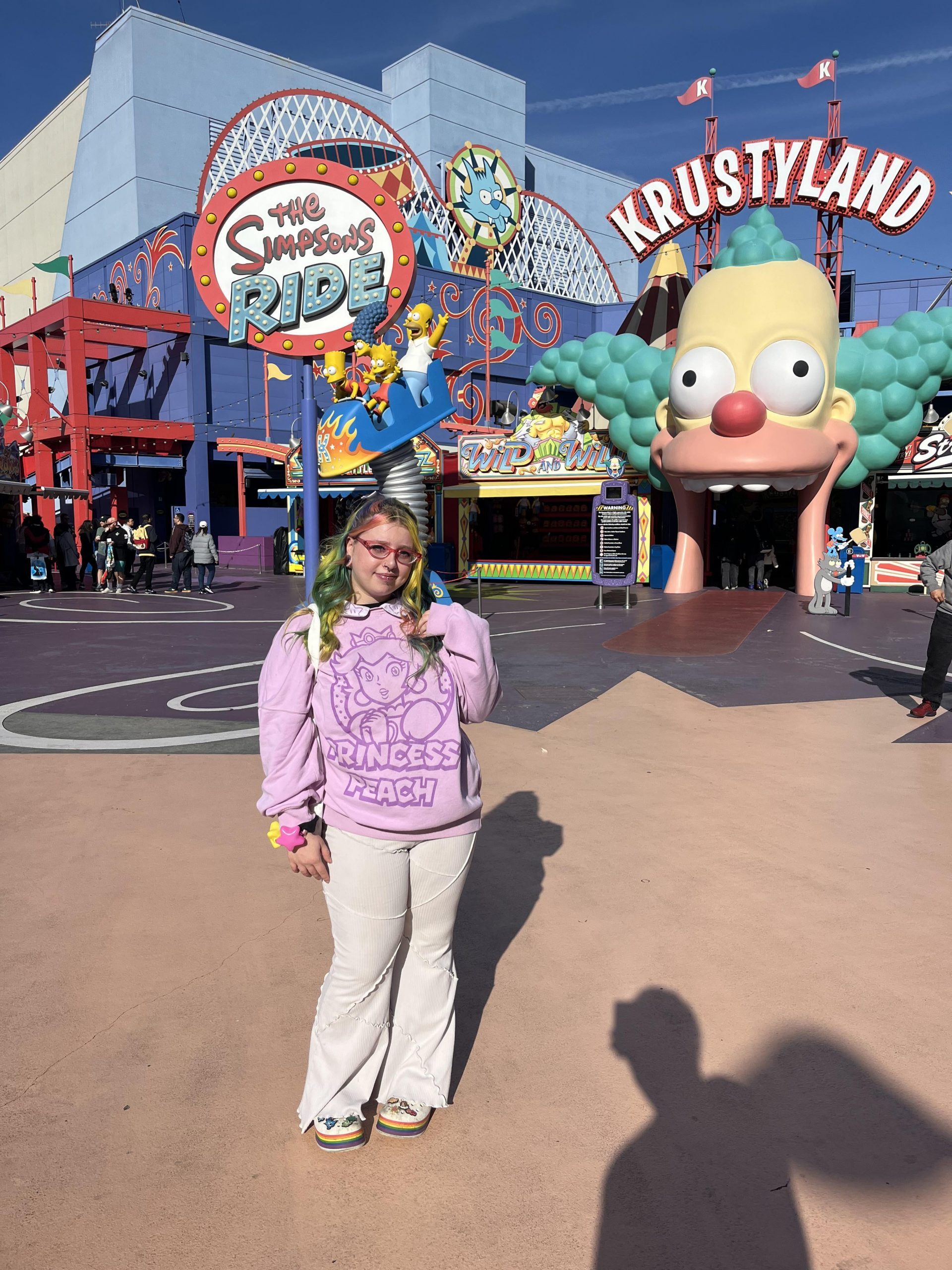 Retro Vibes with a Graphic Sweatshirt and Flared Pants Retro Vibes with a Graphic Sweatshirt and Flared Pants — Universal Studios Outfits