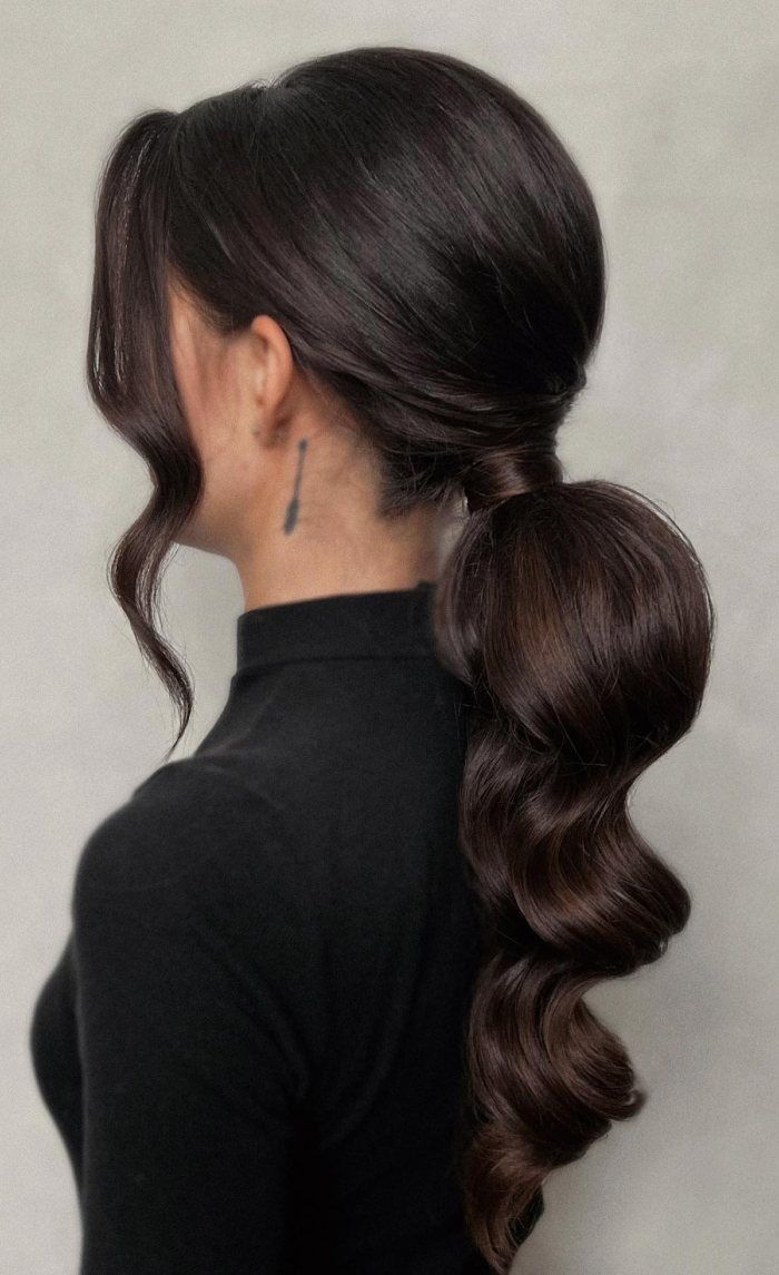 Glossy Dark Brown Ponytail With Voluminous Waves — Sleek Low Ponytail