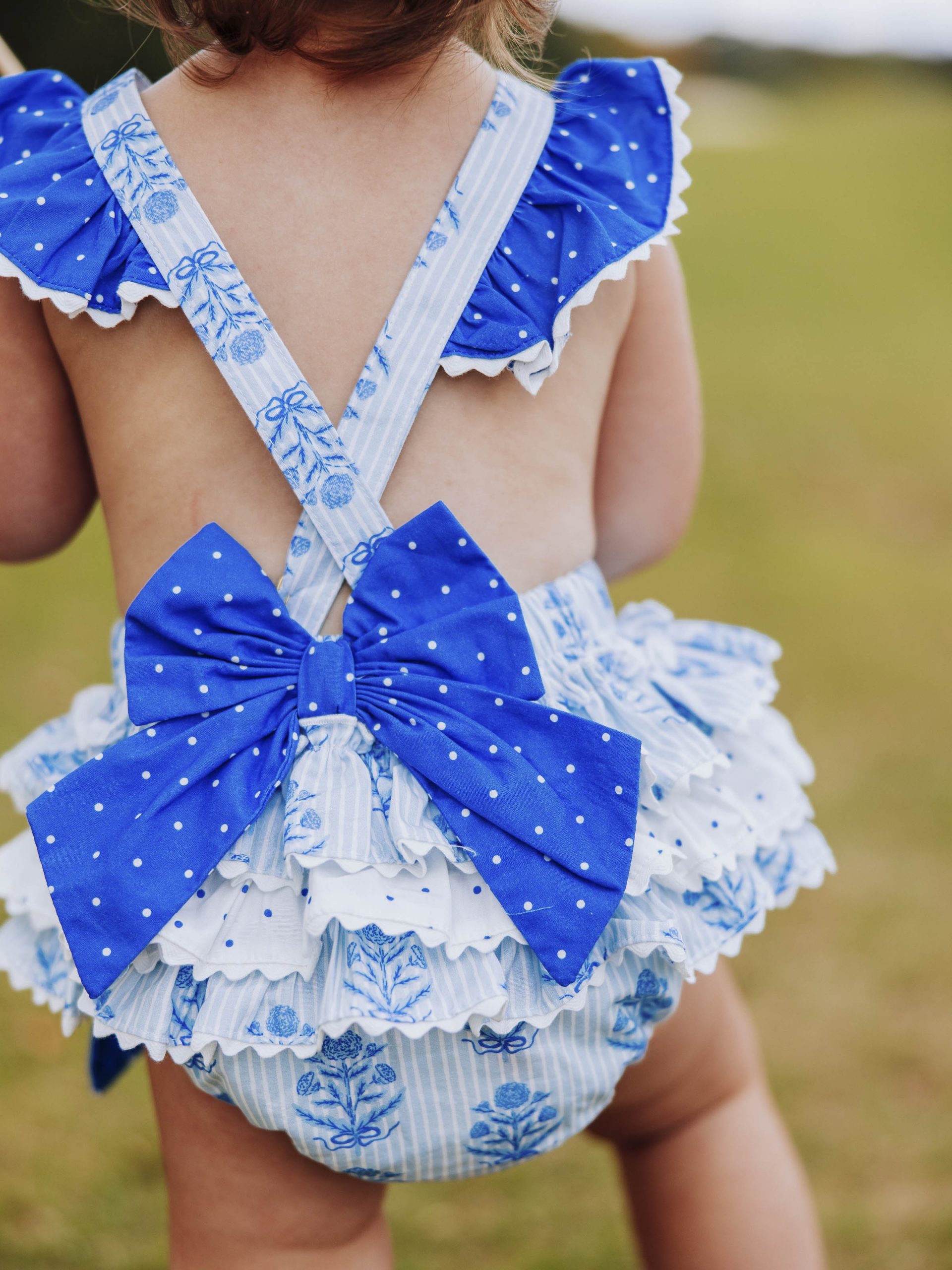 Playful Polka Dot and Floral Romper with Bow Detail Playful Polka Dot and Floral Romper with Bow Detail — Baby Outfits