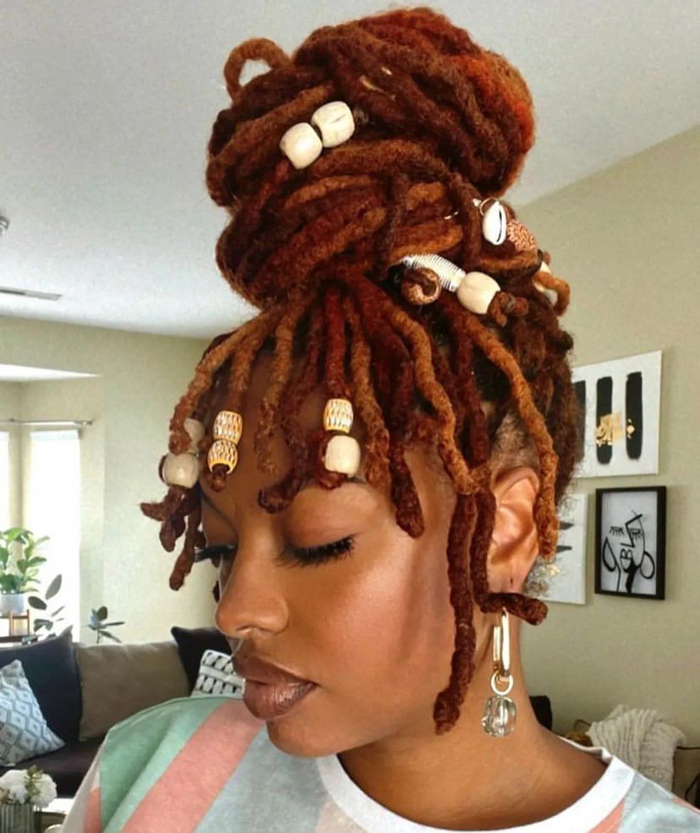 Auburn Loc Bun with Beads and Face-Framing