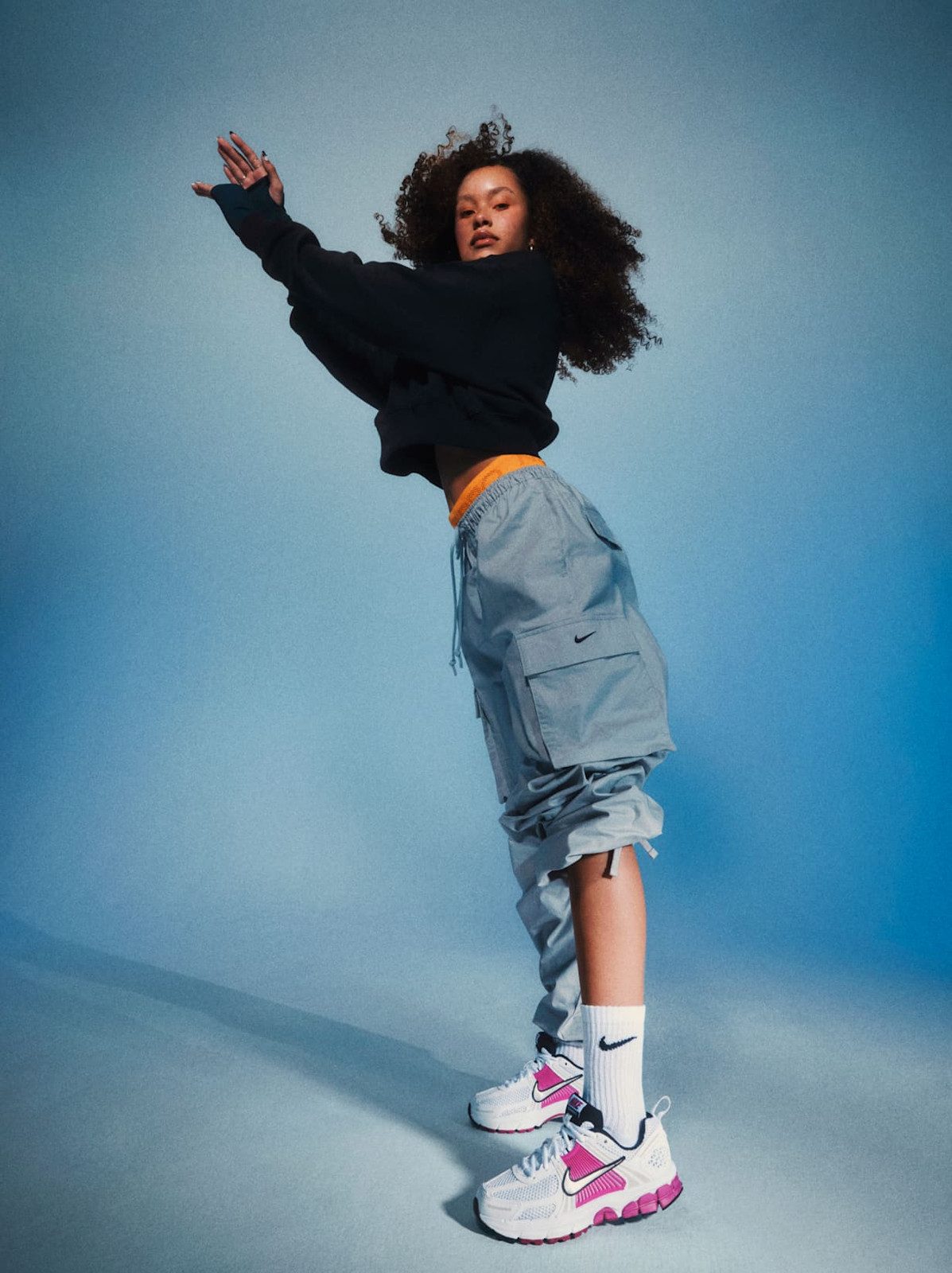 Streetwear Cool with Cargo Pants and Oversized Sweatshirt — Nike Vomero Outfits