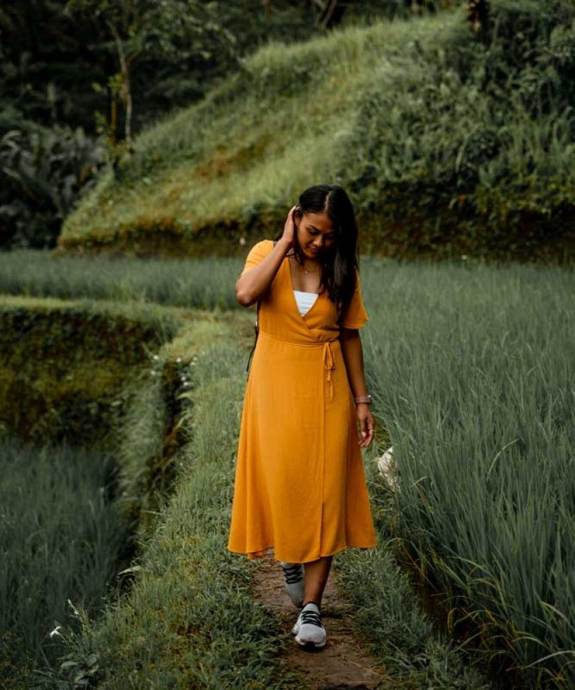 Vibrant Yellow Wrap Dress for Tropical Travel — Bali Outfits