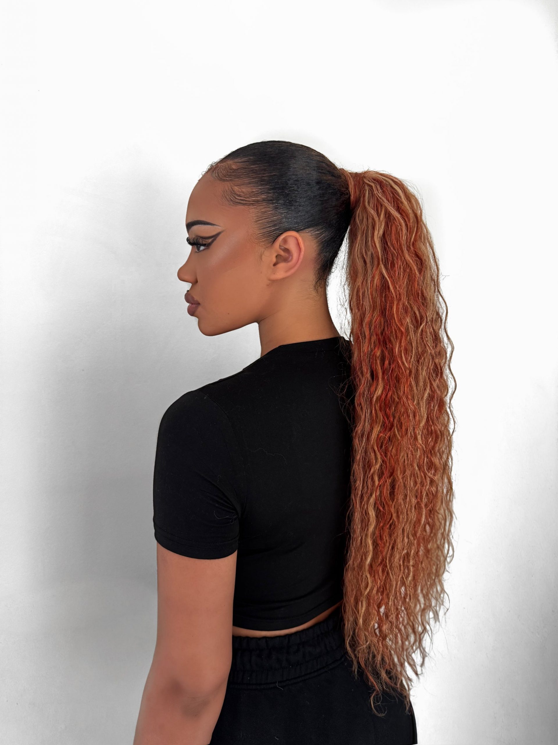 High Ponytail With Auburn-Tipped Curls — Curly Ponytail