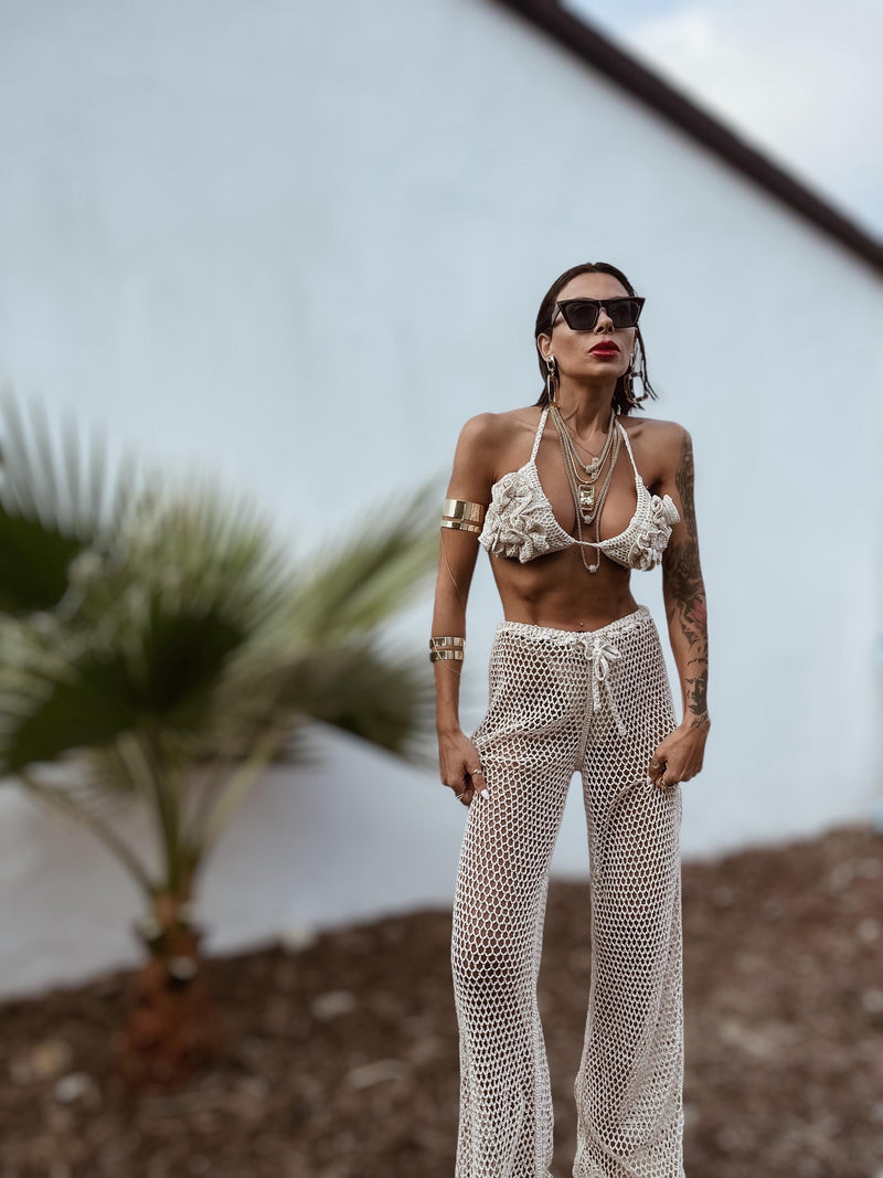 White Crochet Festival Set with Halter Top and Wide-Leg Pants White Crochet Festival Set with Halter Top and Wide-Leg Pants — Crochet Outfits