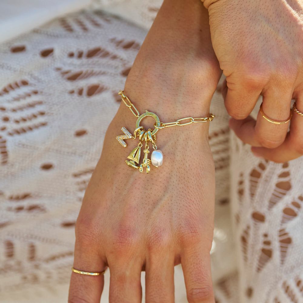 Chunky Gold Chain Bracelet with Nautical and Alphabet Charms Chunky Gold Chain Bracelet with Nautical and Alphabet Charms — Charm Bracelets