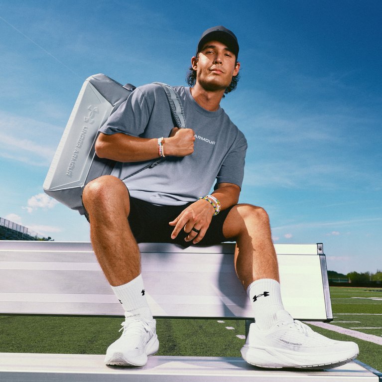 Casual Gym Comfort: Grey T-Shirt, Black Shorts, and Duffel Bag — Mens Gym Outfits