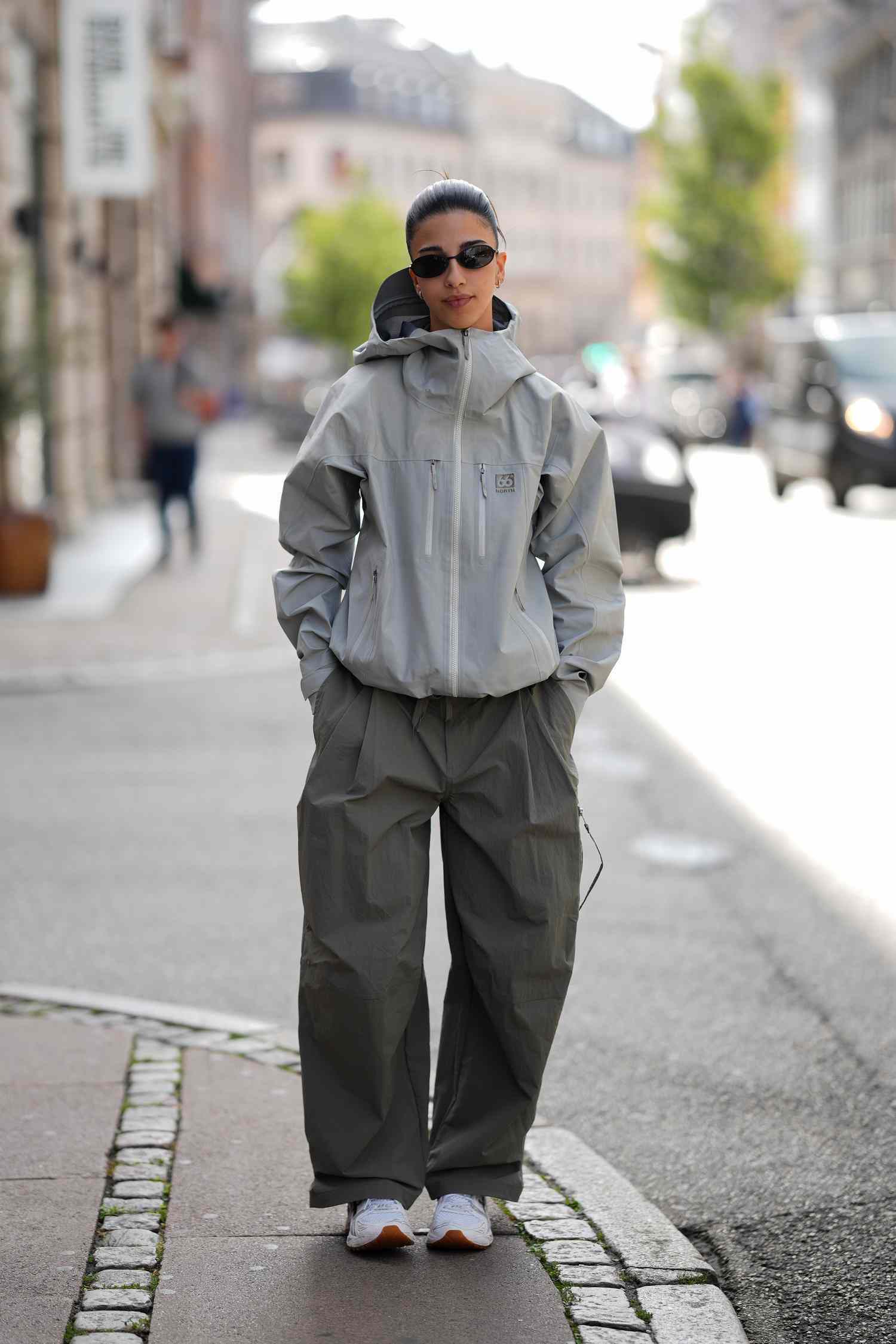 Urban Utility: Hooded Jacket and Cargo Pants for Wet Streets Urban Utility: Hooded Jacket and Cargo Pants for Wet Streets — Rainy Day Outfits