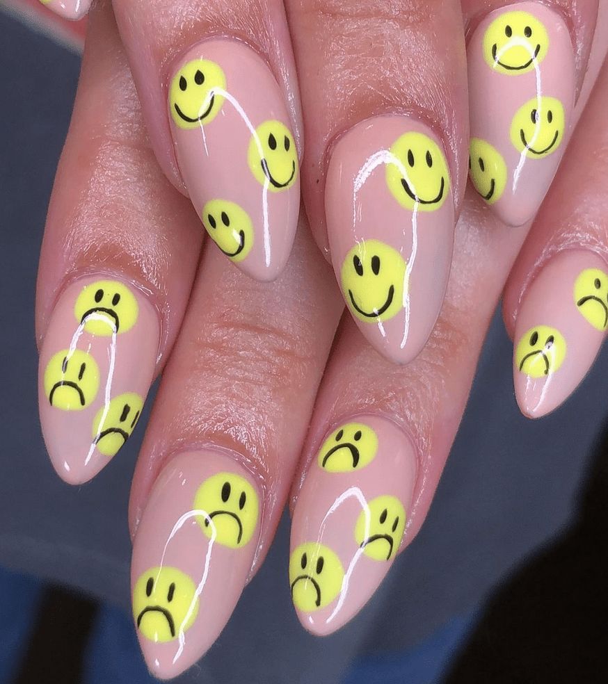 Long Nude With Scattered Smile and Sad Faces — Smiley Face Nails
