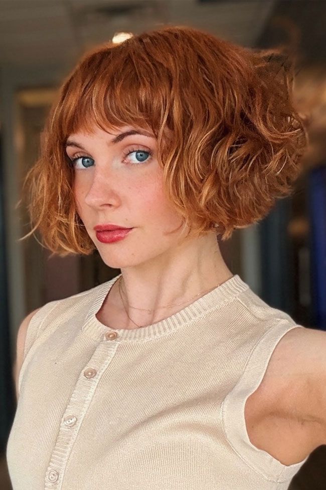 Auburn Bob With Wispy Baby Bangs — Curly Bob