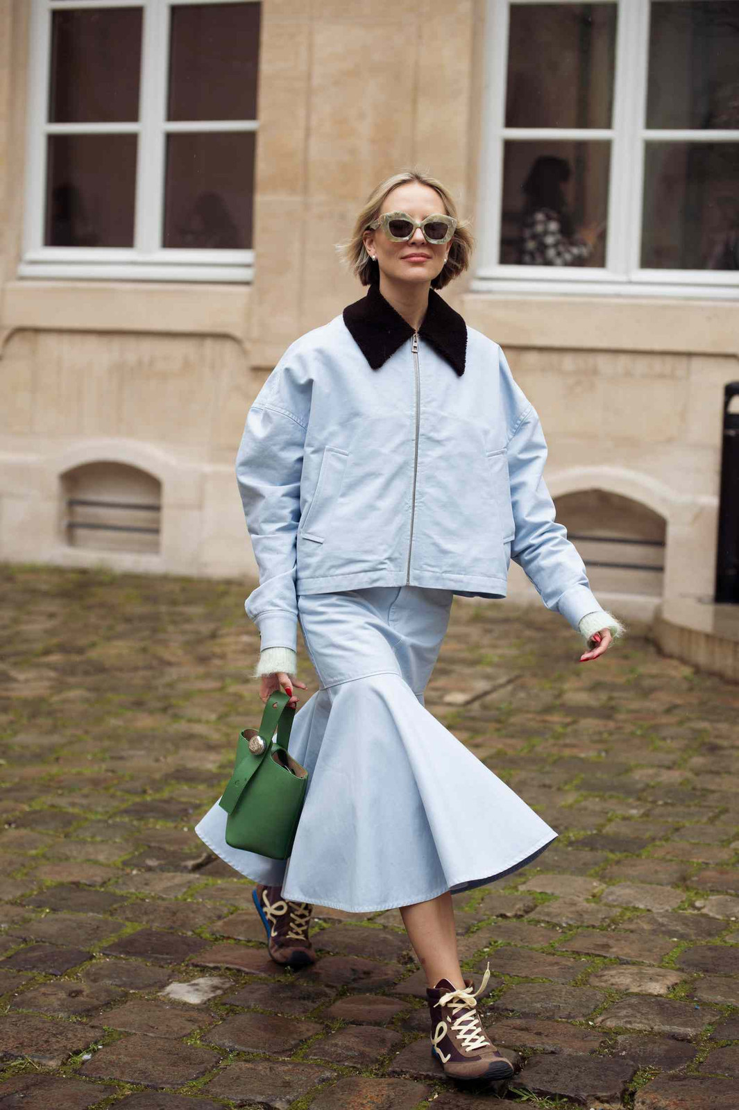Bomber Jacket and Flared Skirt Paired with Boots — Retro Sneakers Outfits