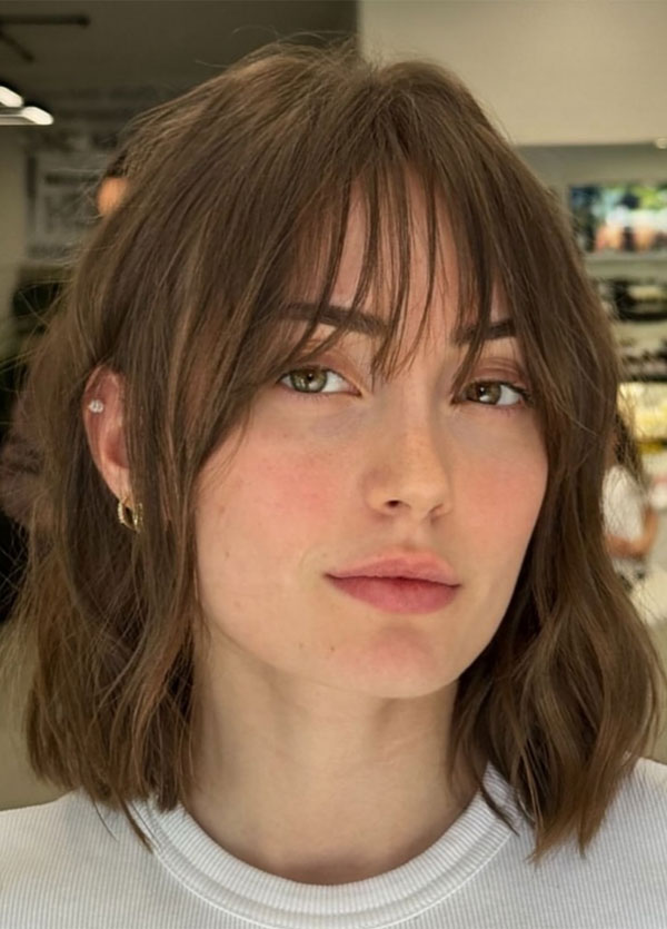 White T-Shirt and Wavy Brown Wispy Bangs