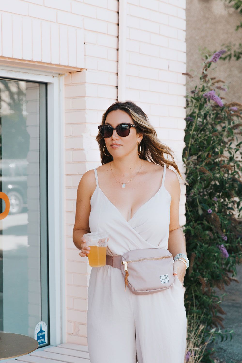 Effortless Chic: Blush Pink Fanny Pack with Jumpsuit Effortless Chic: Blush Pink Fanny Pack with Jumpsuit — Fanny Pack Outfits