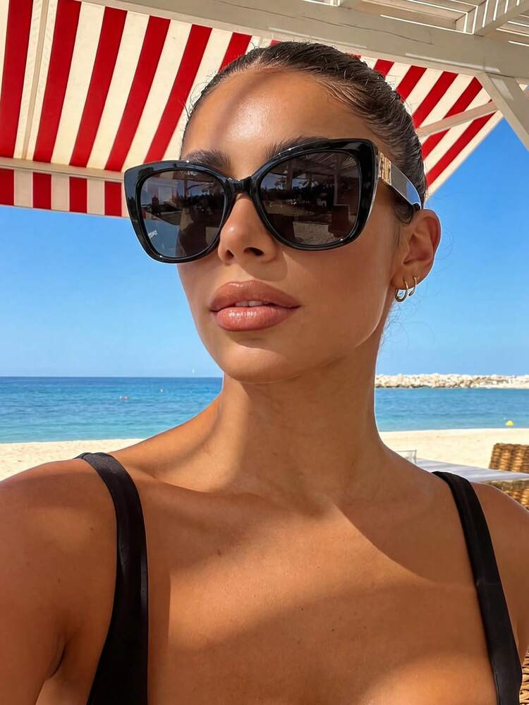 Beach Vacation Ready: Black Swimsuit Top and Cat-Eye Sunglasses — Oversized Sunglasses Outfits