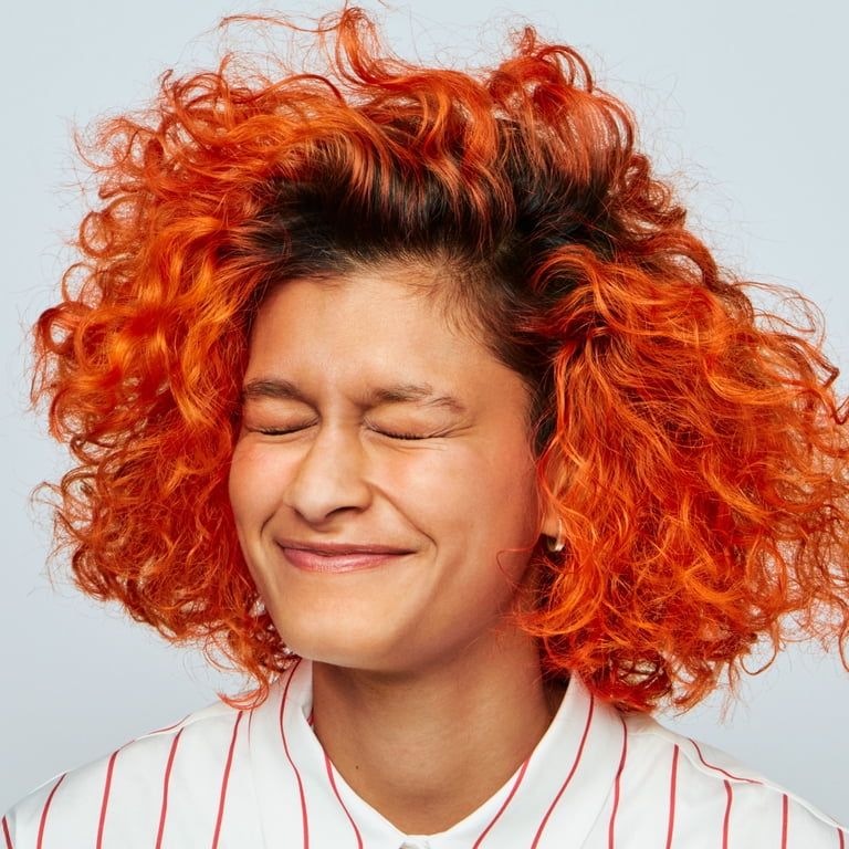 Voluminous Tangerine Curly Bob Voluminous Tangerine Curly Bob — Tangerine Hair