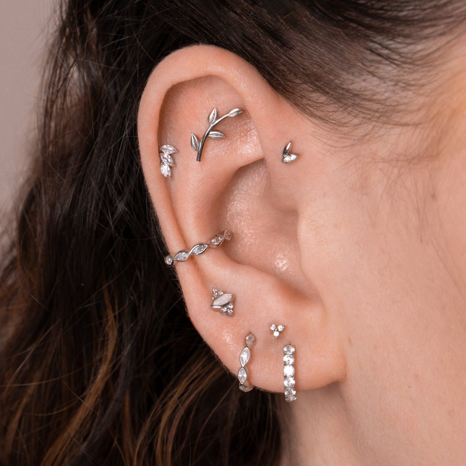 Chic Silver Ear Curation with Leaf and Marquise Studs Chic Silver Ear Curation with Leaf and Marquise Studs — Ear Piercing Ideas