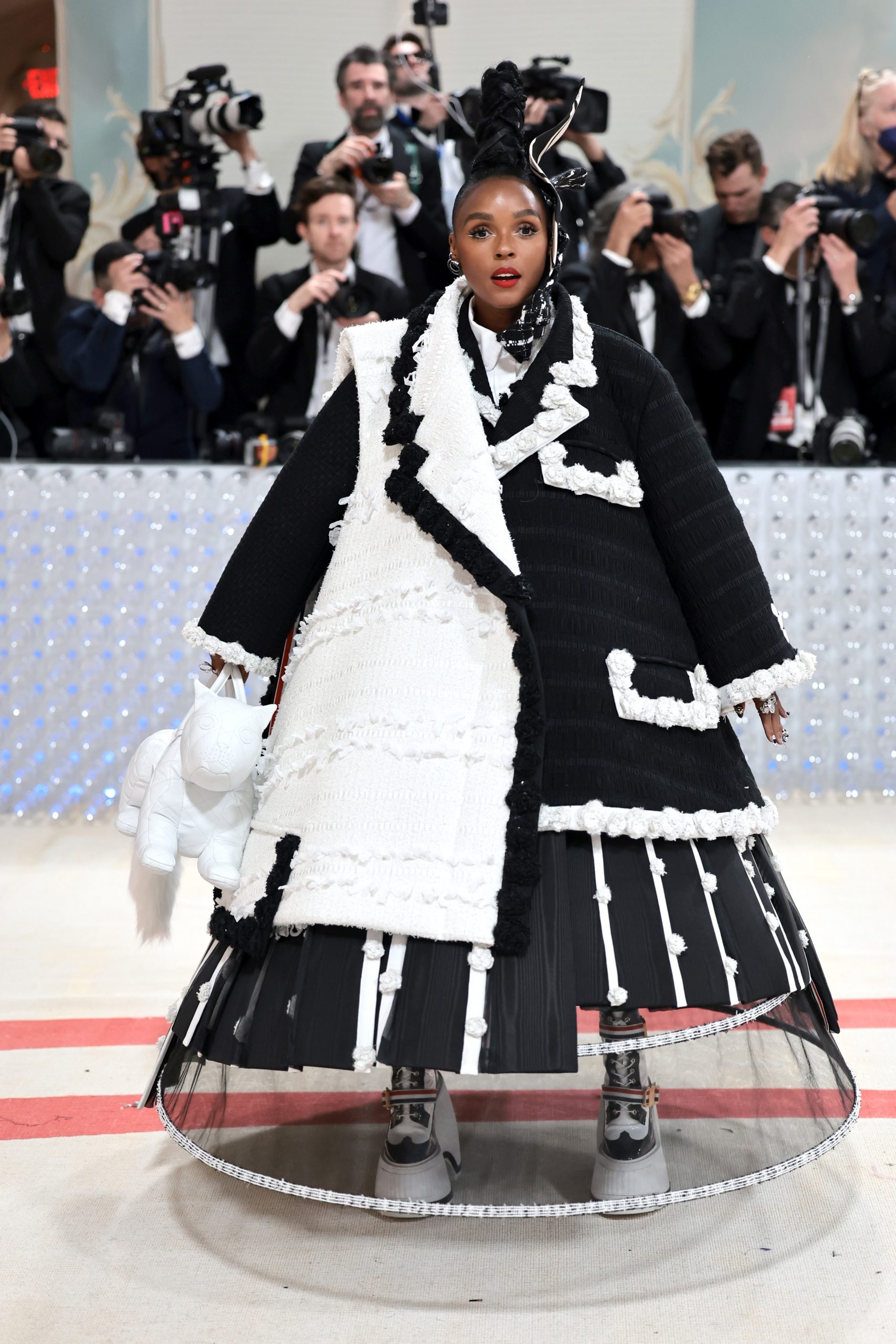 Textured Black and White Coat Over Pleated Skirt Ensemble — Gala Outfits