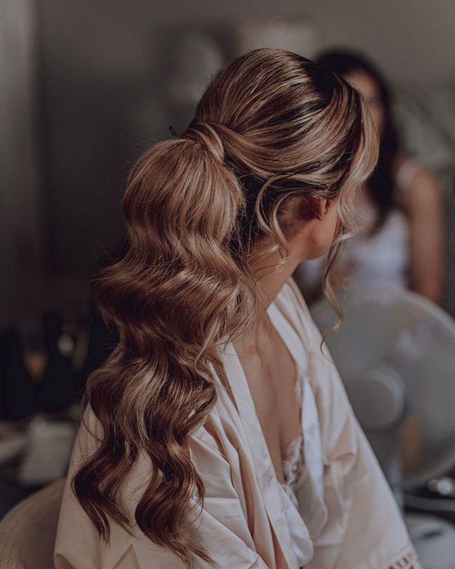 Soft Waves Low Ponytail with Wispy Bangs — Engagement Photo Hairstyles
