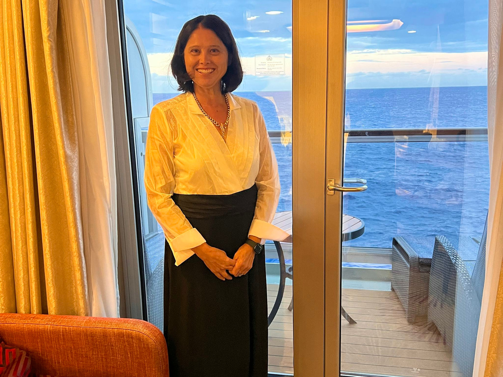 Classic White Wrap Blouse and Black A-Line Skirt — Cruise Dinner Outfits