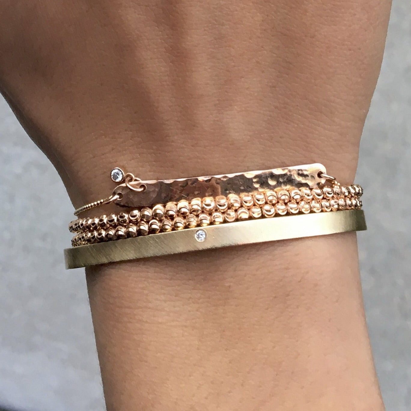 Stack of Gold and Rose Gold Bracelets with Hammered Cuff Stack of Gold and Rose Gold Bracelets with Hammered Cuff — Gold Jewelry