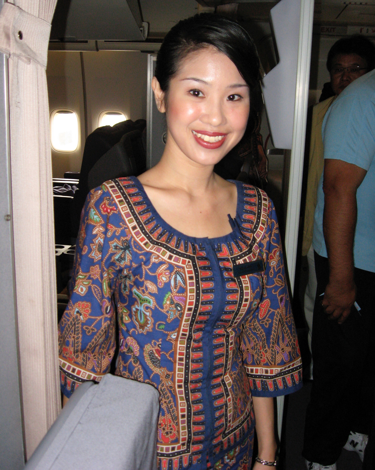 Sleek Black Bun for Uniforms — Hairstyles for Flight Attendants
