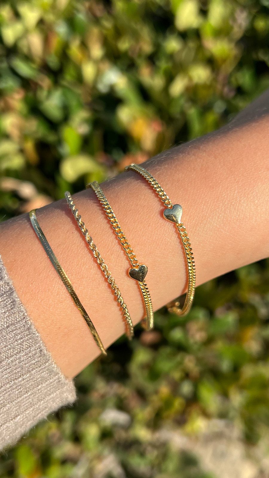 Delicate Heart Charms on Stacked Gold Bracelets Delicate Heart Charms on Stacked Gold Bracelets — Charm Bracelets