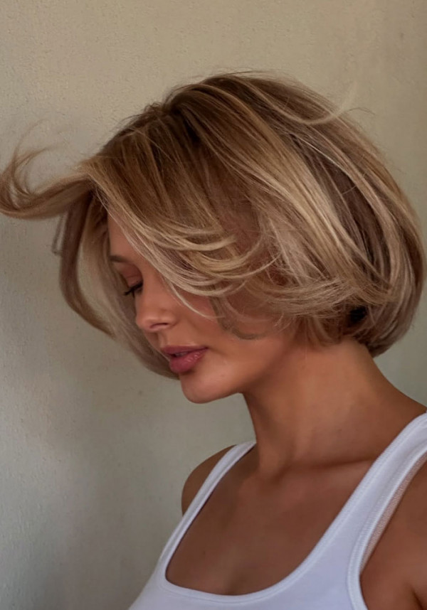 Voluminous Bob With Curtain Bangs Voluminous Bob With Curtain Bangs — Face Framing Highlights