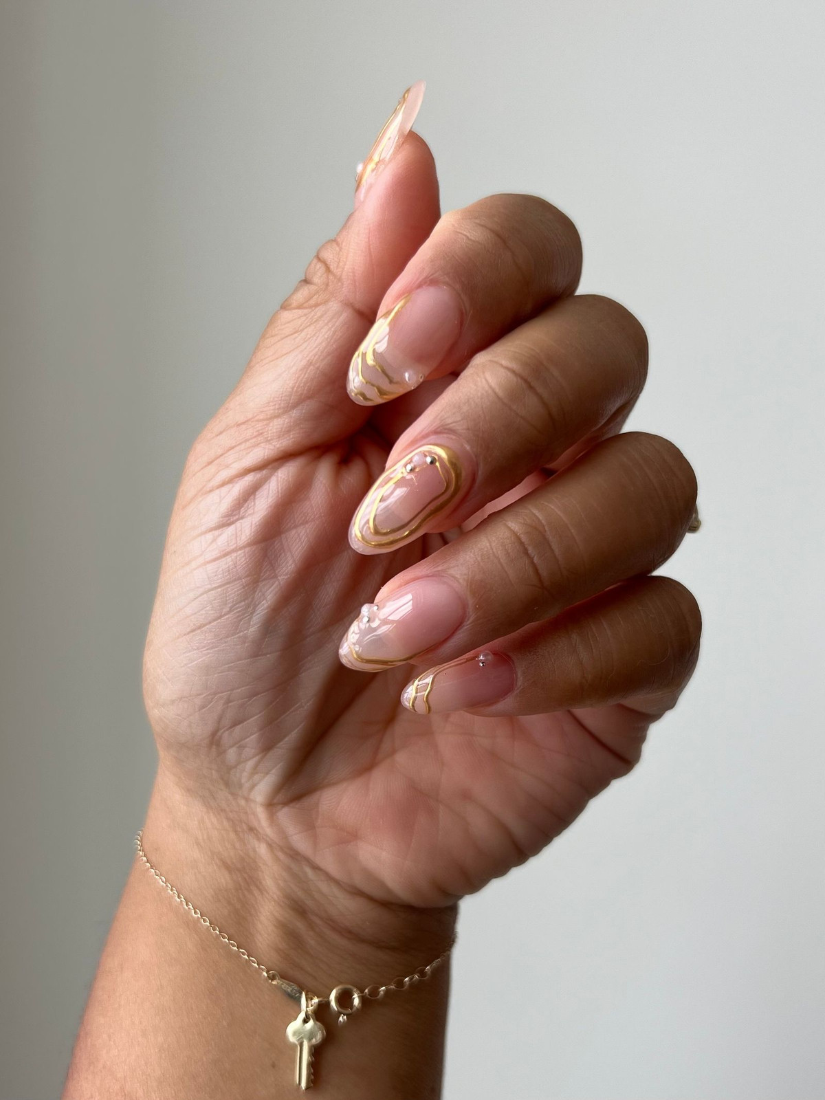 Abstract Gold Line Stiletto Nails — Anniversary Nails
