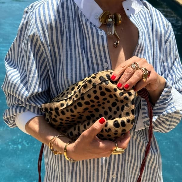 Striped Shirt and Jeans with a Bold Leopard Print Clutch — Clutch Outfits