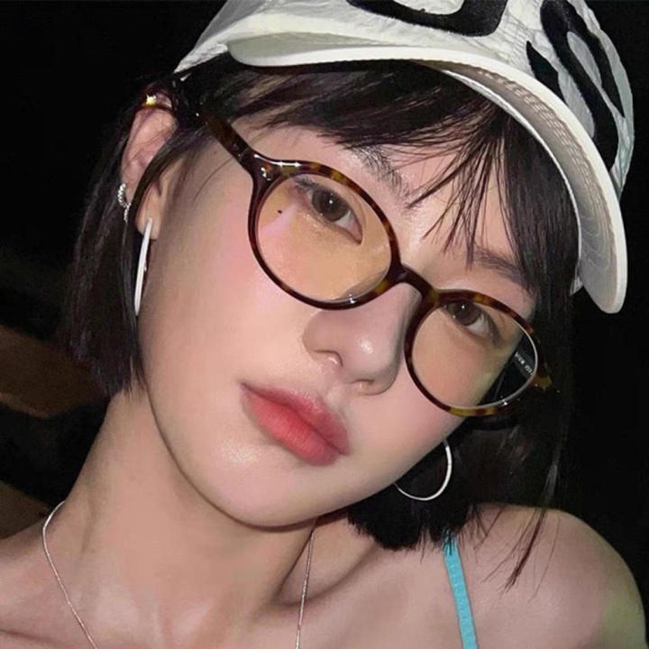 Tortoiseshell Oval Sunglasses with Yellow Lenses and Blue Tank — Oval Sunglasses Outfits