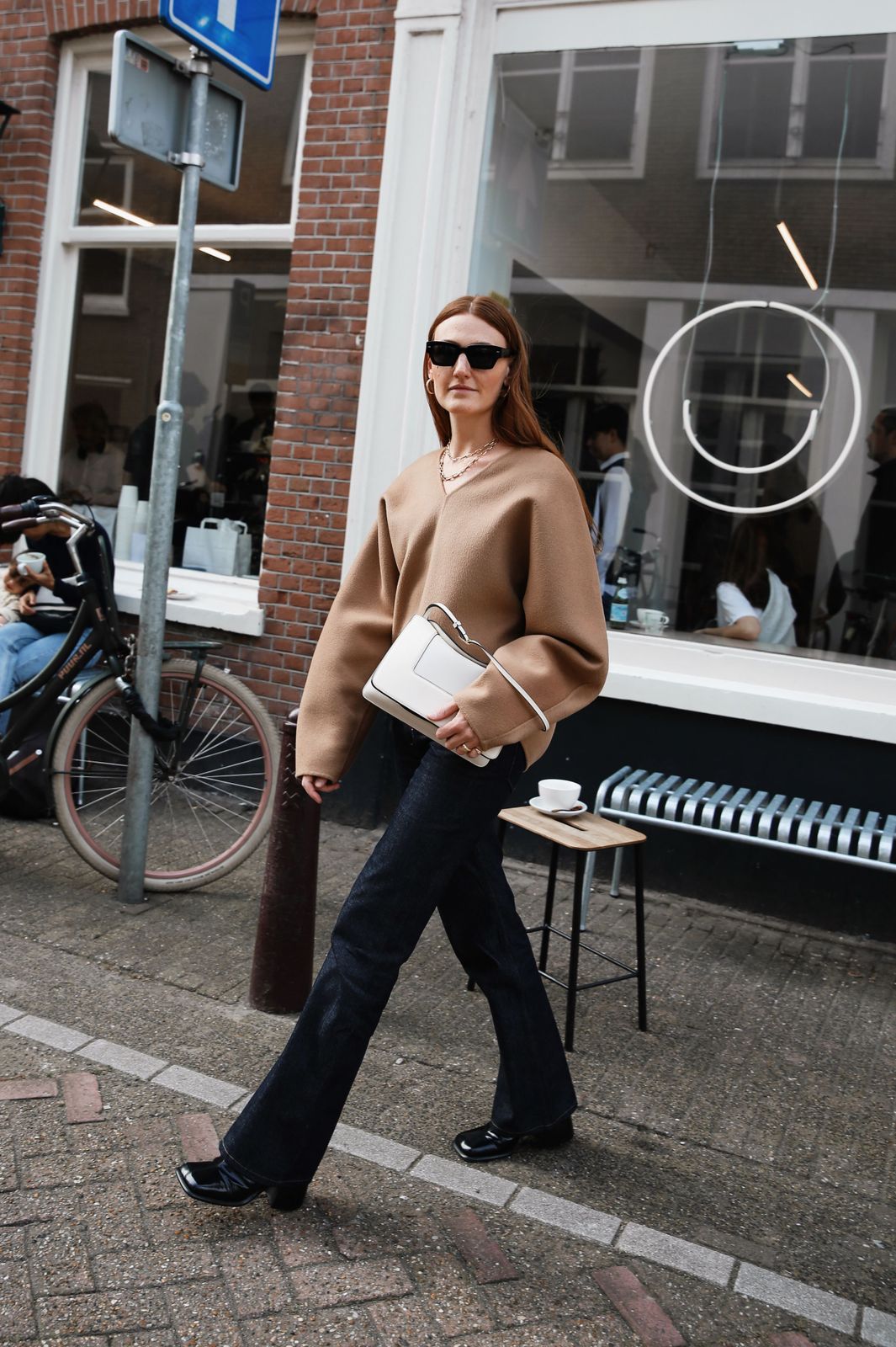 Cozy Knit Sweater Paired with Flare Jeans Cozy Knit Sweater Paired with Flare Jeans — Amsterdam Outfits