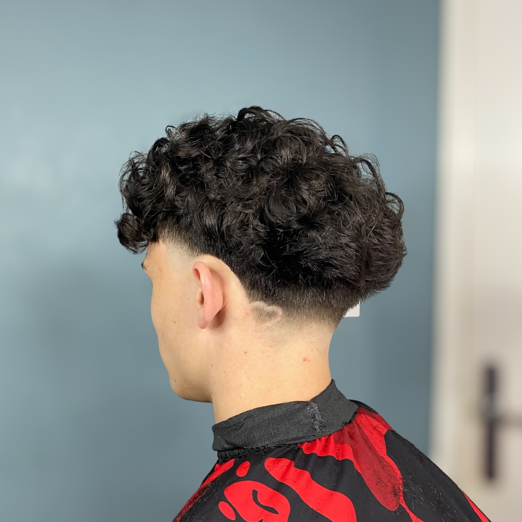 Curly Blowout Taper With Heart Design