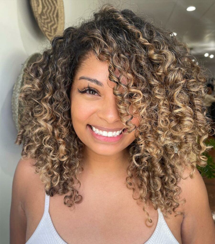Side Swept Bangs Visual Idea — Balayage Curly Hair