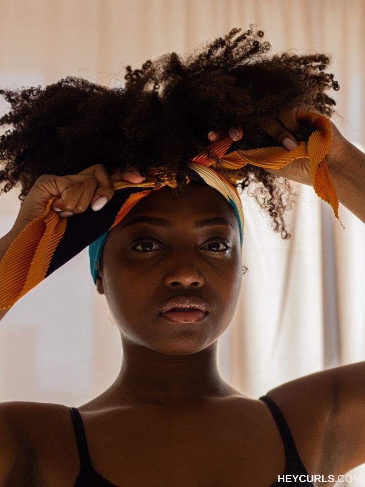 High Bun Wrapped in Pleated Scarf — Scarf Hairstyles