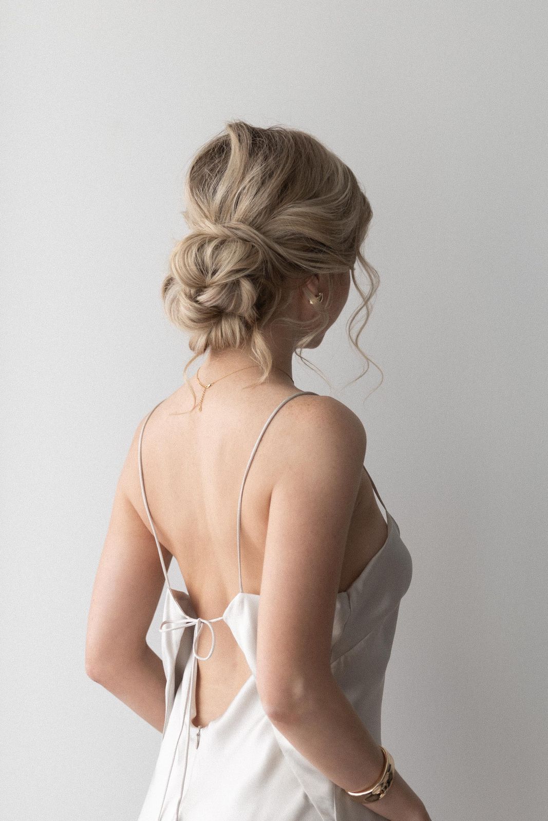 Messy Blonde Updo with Braids — Quinceanera Hairstyles