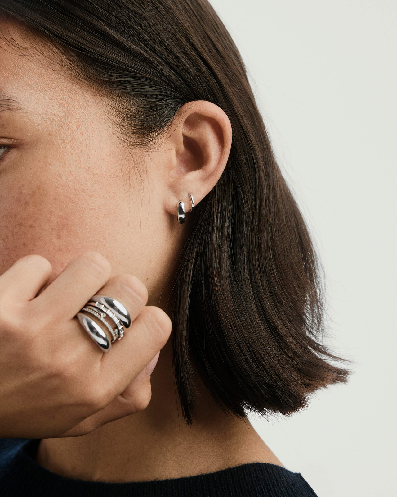 Modern Edge: Silver Huggie Hoops with Stacked Rings — Silver Hoops Outfits