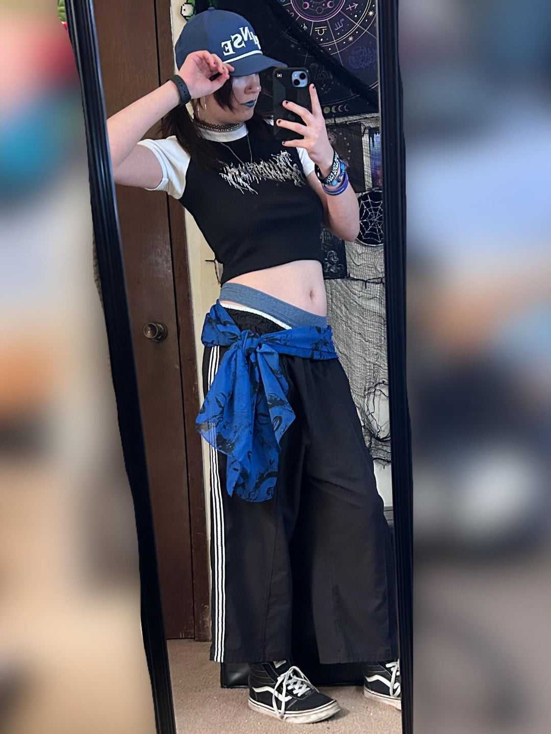 Streetwear Staple: Cropped Tee, Track Pants, and Blue Scarf Accent Streetwear Staple: Cropped Tee, Track Pants, and Blue Scarf Accent — McBling Outfits